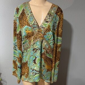 Animal print/multicolor blouse featuring sequin embellishments.
